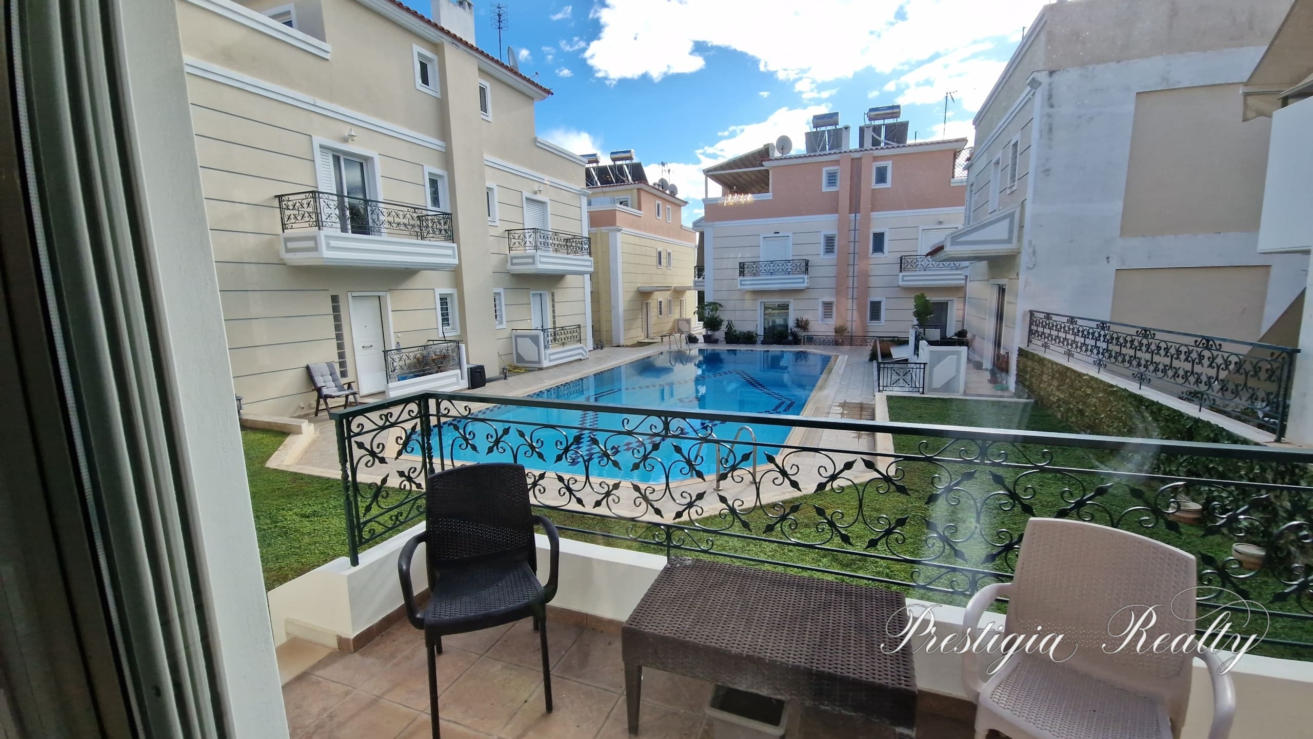 Balcony with stunning pool view in a maisonette in Vari, Athens Riviera