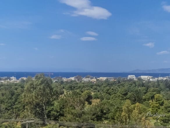 Luxury penthouse maisonette in Glyfada Golf featuring rooftop pool, panoramic sea and skyline views, and modern architecture in an elite Athenian neighborhood