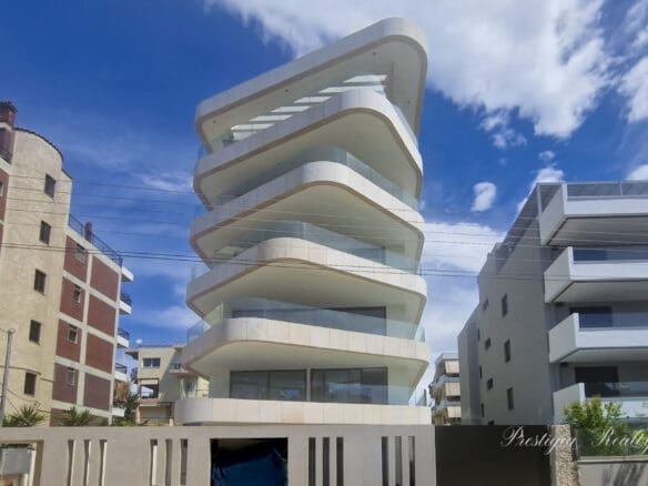 Luxury penthouse maisonette in Glyfada Golf featuring rooftop pool, panoramic sea and skyline views, and modern architecture in an elite Athenian neighborhood