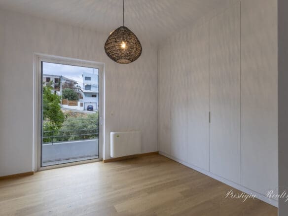 Stylish elevated Ground-Floor Apartment in Voula – Sunlit Spaces & Partial Sea Views | 111 sq.m.