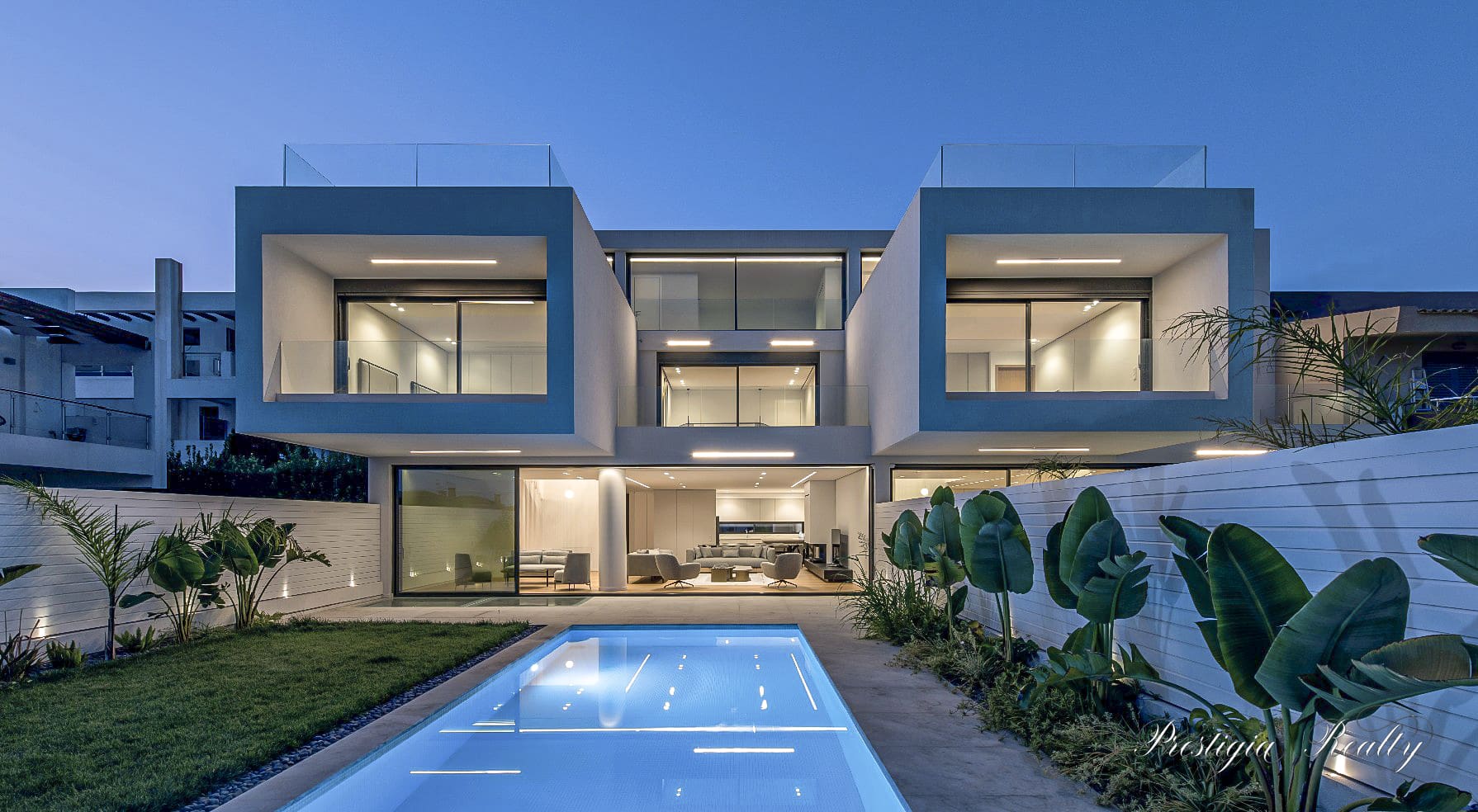 Luxury villa for sale in Vari Athens Riviera with private pool, garden, and modern outdoor living space