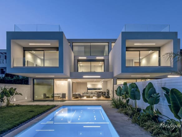 Luxury villa for sale in Vari Athens Riviera with private pool, garden, and modern outdoor living space